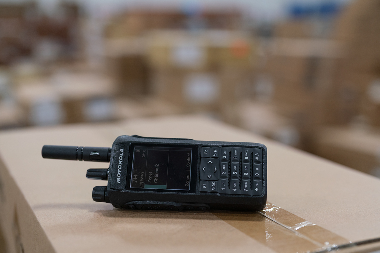 Motorola two-way radio on a cardboard box